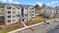 Apartment Building Exterior + Resident Walkway Apartment Building Exterior + Resident Walkway l Luxury Apartments and Townhomes for Rent in Bremerton, WA l Blue Ridge Apartments