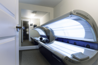 Explore Stonegate Apartments Modern indoor tanning suite with high-tech tanning beds and sleek interior.