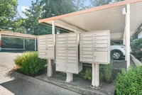 Secure mailboxes with covered access for resident convenience.