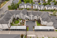 Spacious community layout with landscaped grounds and convenient parking.