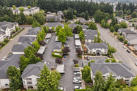 Bird’s-eye view of our apartment community with beautifully landscaped grounds, covered parking, and easy access to nearby roads.