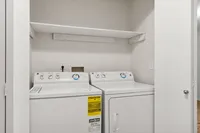 Convenient in-home laundry with extra storage.