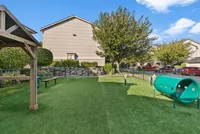 A community Dog Park— Our fenced dog park has space to play, train, and relax.