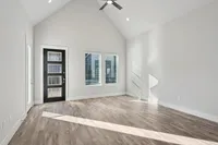 living area with cathedral ceilings