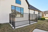fenced back patio