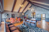 The Grand Reserve at Madison clubroom with seating and tables