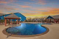The Grand Reserve at Madison Sparkling swimming pool at sunset
