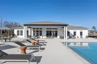 Sanctuary at Indian Creek Sparkling swimming pool and lounge chairs