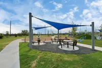 Villas at Sunterra outdoor seating under shade