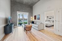 Luna at Viera Stylish living room with accent wall and ceiling