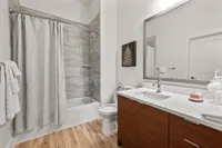 Luna at Viera Modern and sleek bathroom with tile surround in shower