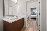 Luna at Viera Modern and sleek bathroom leading into walk through closet and guest bedroom