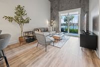 Luna at Viera Decorated living area with statement wall and view