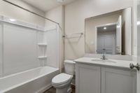Guest bathroom with shower and tub combo