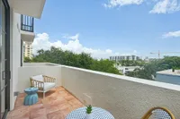 Balcony with table and chairs