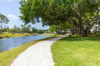 Tradition at Palm Aire Walking path along the pond