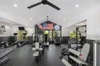 Fitness center with cardio equipment, machines and free weights
