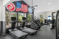 Fitness center with cardio equipment, machines and free weights