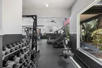 Fitness center with cardio equipment, machines and free weights