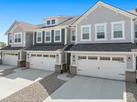 Front of townhomes with attached two car garages