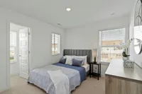 Guest bedroom with walk-in closet