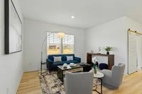Dog-Friendly Townhomes In Brownsburg, IN – Wynne Farms – Hardwood Flooring Living Area With Large Window.