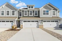 Townhomes With Attached Garage in Brownsburg, IN – Wynne Farms – Attached 2-Car Garage, Spacious Driveway With Ring Video Doorbell Pro.