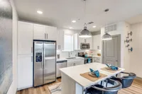 kitchen with stainless steel appliances and prep island