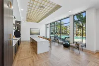 Clubroom with seating and view of pool
