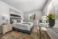 furnished bedroom with natural light