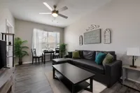 Model living room with black couch