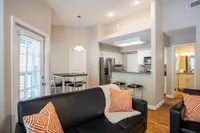 model home with black couch