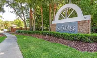 entrance with monument sign of community