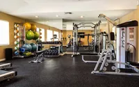 Fitness center with free weights, machines and cardio equipment