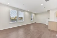 living room leading to upstairs