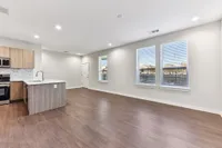 large living room with open kitchen