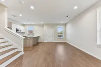 open living room with kitchen access