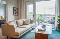 decorated living area with large windows