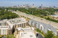 Building overview with Atlanta skyline in background