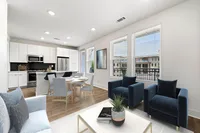 open concept living and dining area next to kitchen