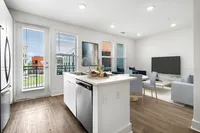 kitchen with island overlooking living area