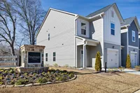 modern exterior townhome and community sign