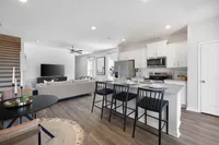 kitchen with island and white cabinetry