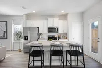 kitchen with island and stainless steel appliances
