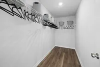 main bedroom walk in closet