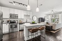 Kitchens at The Jane with white cabinets and large island