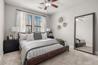 Primary bedroom with large bed
