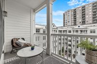 Balcony overlooking the city and the pool