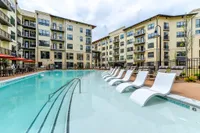 Swimming pool with tanning deck