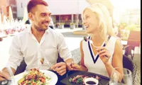 couple eating at restaurant outdoors